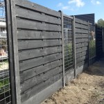Levering en montage in Numansdorp - standaard hout-beton schutting zwart