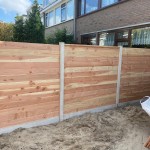 Levering en montage in Maassluis - standaard hout-beton schutting